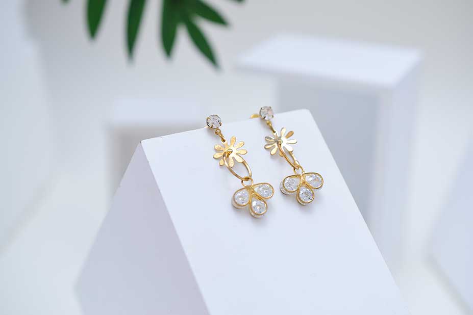 Gold earrings and necklaces