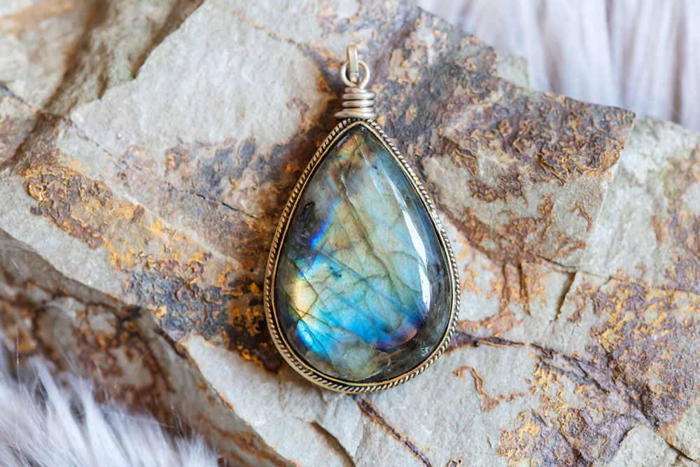 Statement gemstone pendant necklace on stone
